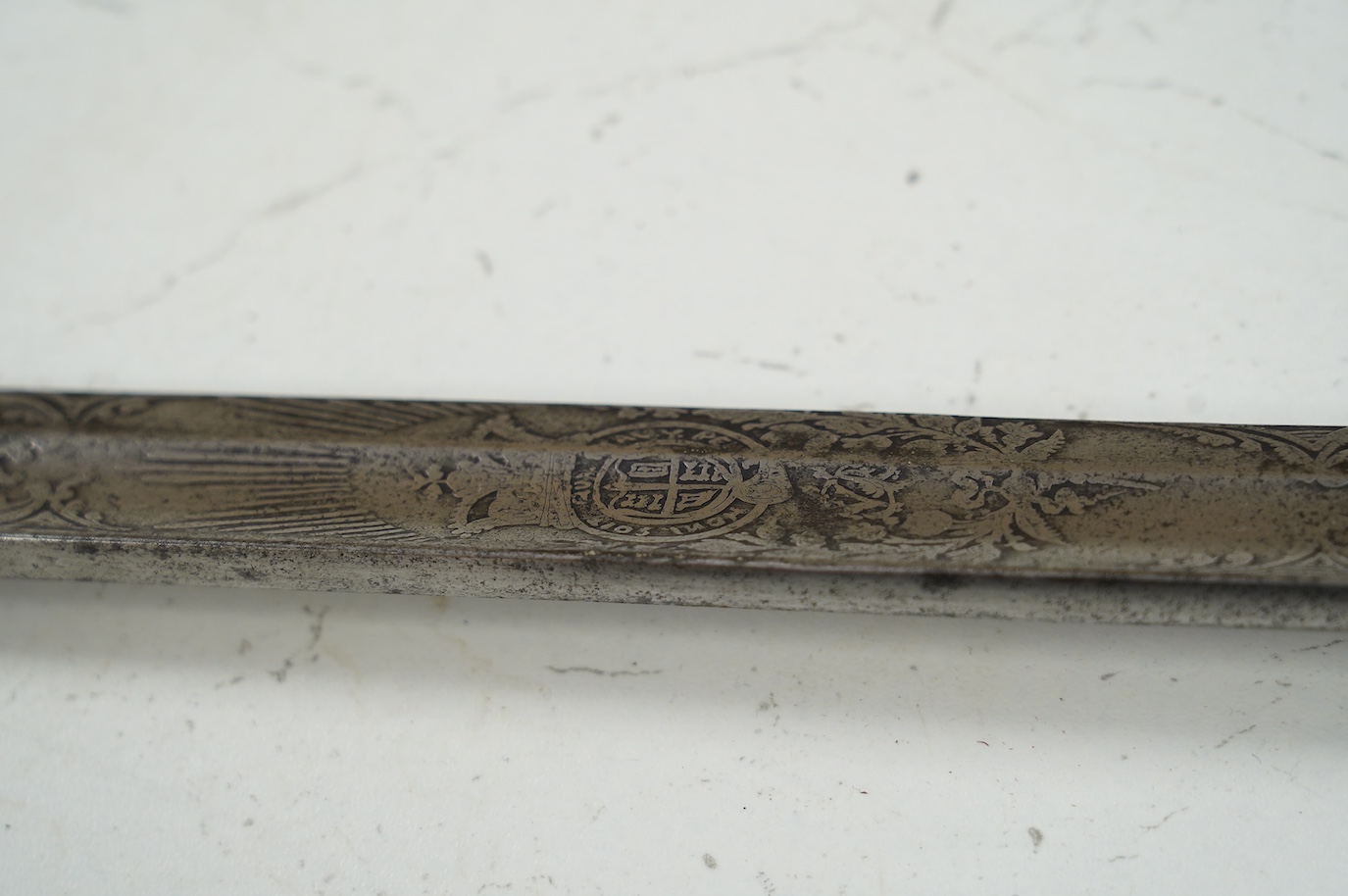 A Victorian Royal Artillery officer’s sword, regulation etched blade, regulation plated hilt, blade 88cm. Condition - fair, well worn